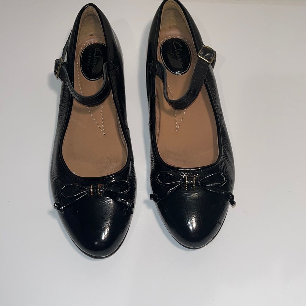 Black patent leather Clarks artisan Mary Jane flats, size 8
